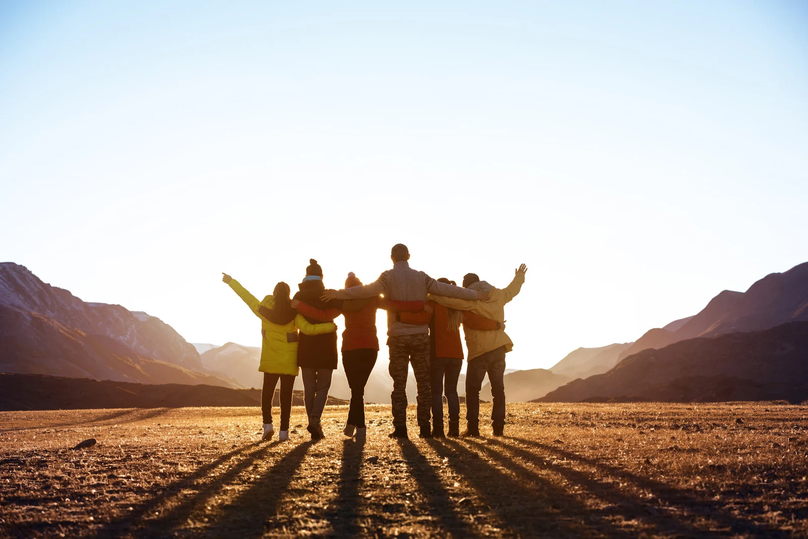 Group of people enjoying sunset